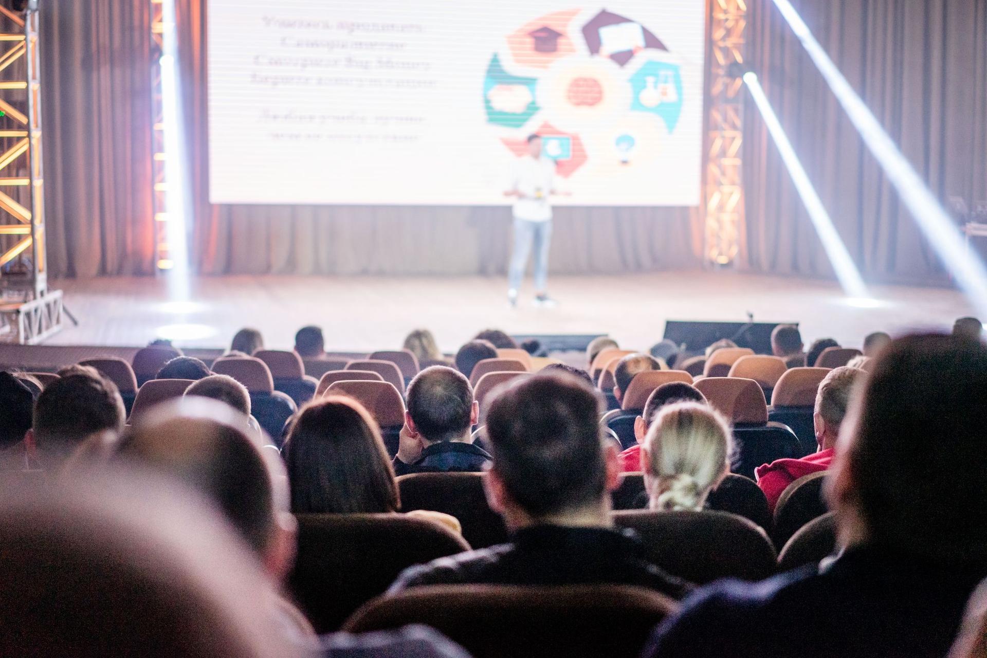 An audience at a property roadshow presentation
